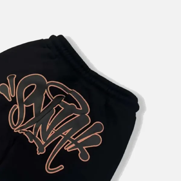 Chándal Syna Logo – Negro/Oro rosa - Image 4